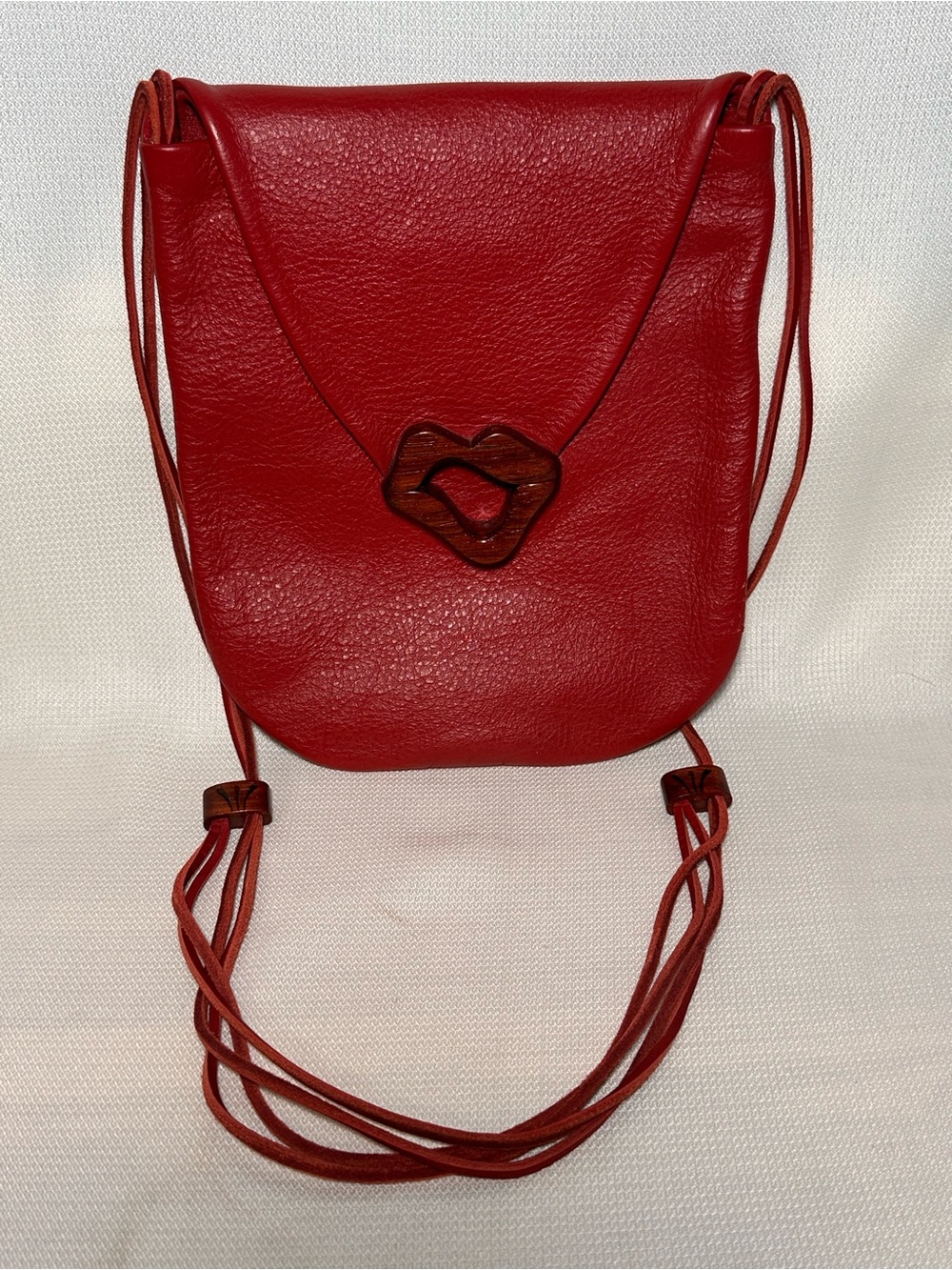 Red Leather Crossbody with Sculptural Wood Kiss Accent Closure